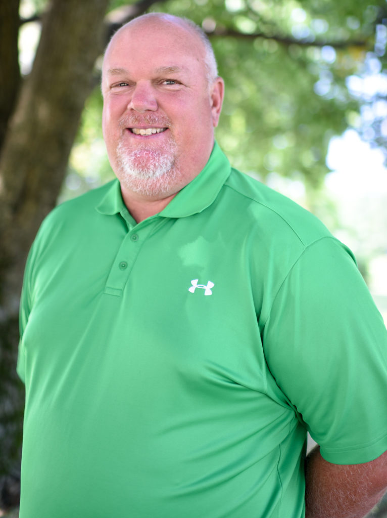 Scott Kennedy wearing green shirt