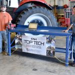 Students and instructors pictured in the Ag Power shop.